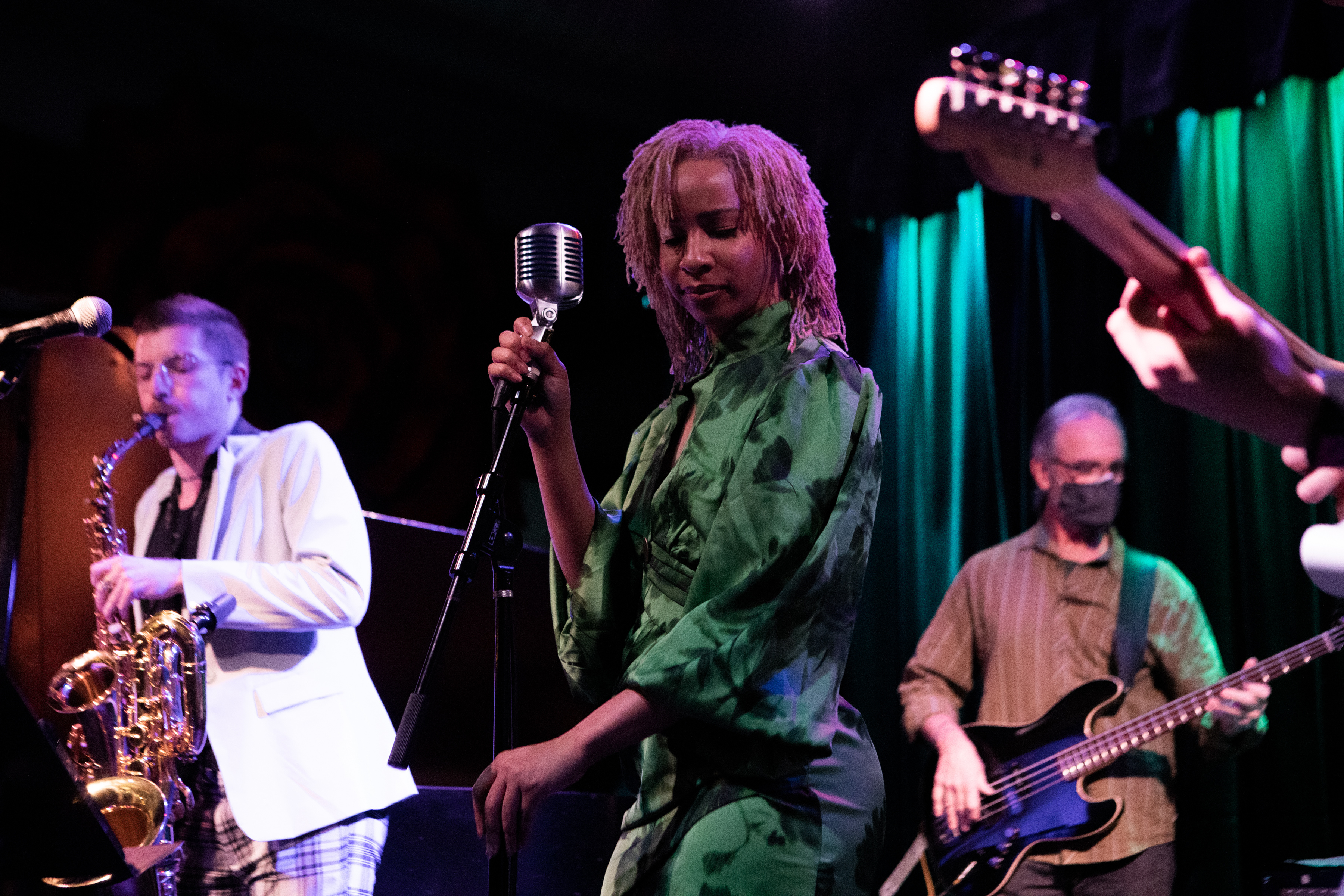 3 JNS musicians perform on-stage.