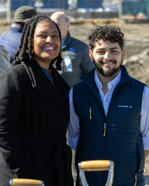 President Francis and FC Tech construction management graduate Harry Rodriguez stand together smiling.