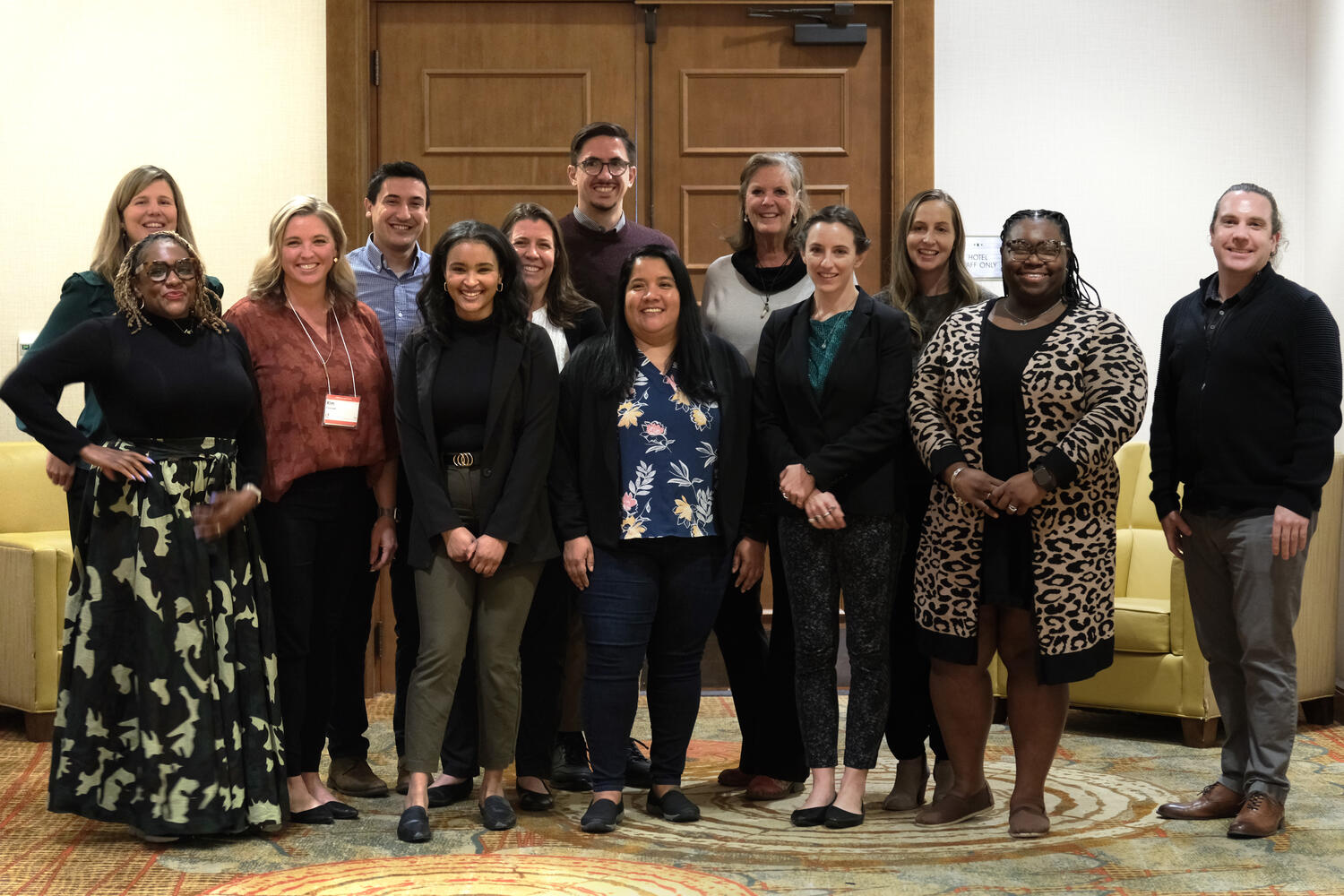 Group photo of 13 consultants from JSI, Think Equity, CCHN, and NFF