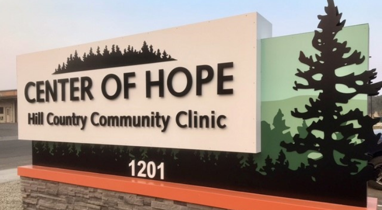 Sign that says "Center of Hope Hill Country Community Clinic"