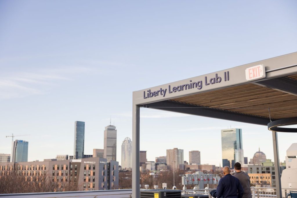 FC Tech’s new Liberty Learning Lab II located on a rooftop with a sweeping view of the city skyline in the background.