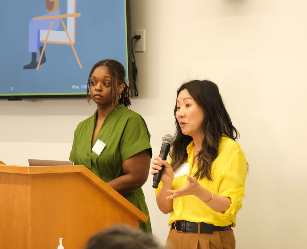 NFF's Annie Chang and Dr. LaShawn Taylor presenting at a podium.